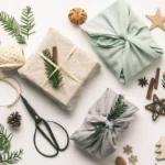 Décorations de Noël écoresponsables : emballages cadeaux en tissu, ornements naturels en bois, branches de sapin et éléments recyclés pour un Noël durable.